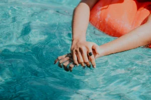 Close-up of the surface of bright, clean pool water